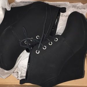 Black wedge boots
